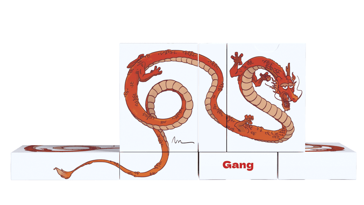 7 game boxes 7 boxes of my card game featuring a Chinese dragon whose long body stretches across several sides of the box.